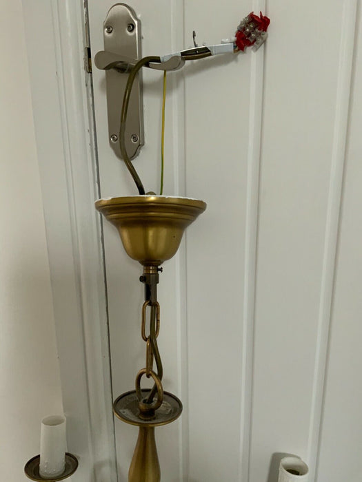 Brass pendant light with candle sleeves